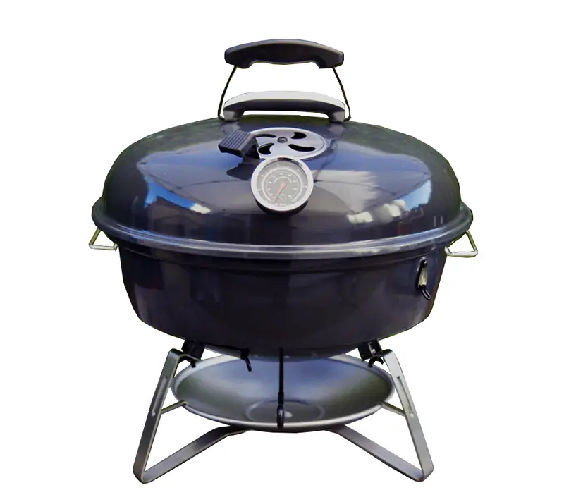 Reisegrill Slow N Sear mit Holzkohlekorb